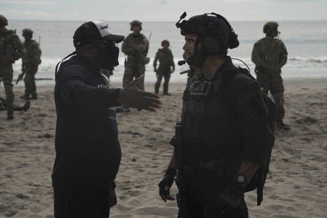 Chris Pratt (right) with director Anton Fuqua shooting "The Terminal List."