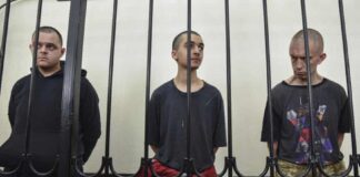 British man Shaun Pinner (R) and Moroccan Saaudun Brahim (C), pictured with Aiden Aslin (L) have reportedly appealed against their death sentences.