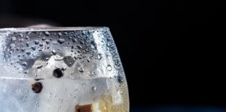 clear glass with an alcoholic drink