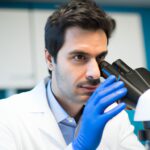 male scientist doing experiments in a lab