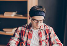 Breaking Barriers: Online MSW Programs Bridge the Gap in Access to Social Work Education male student studying in front of laptop